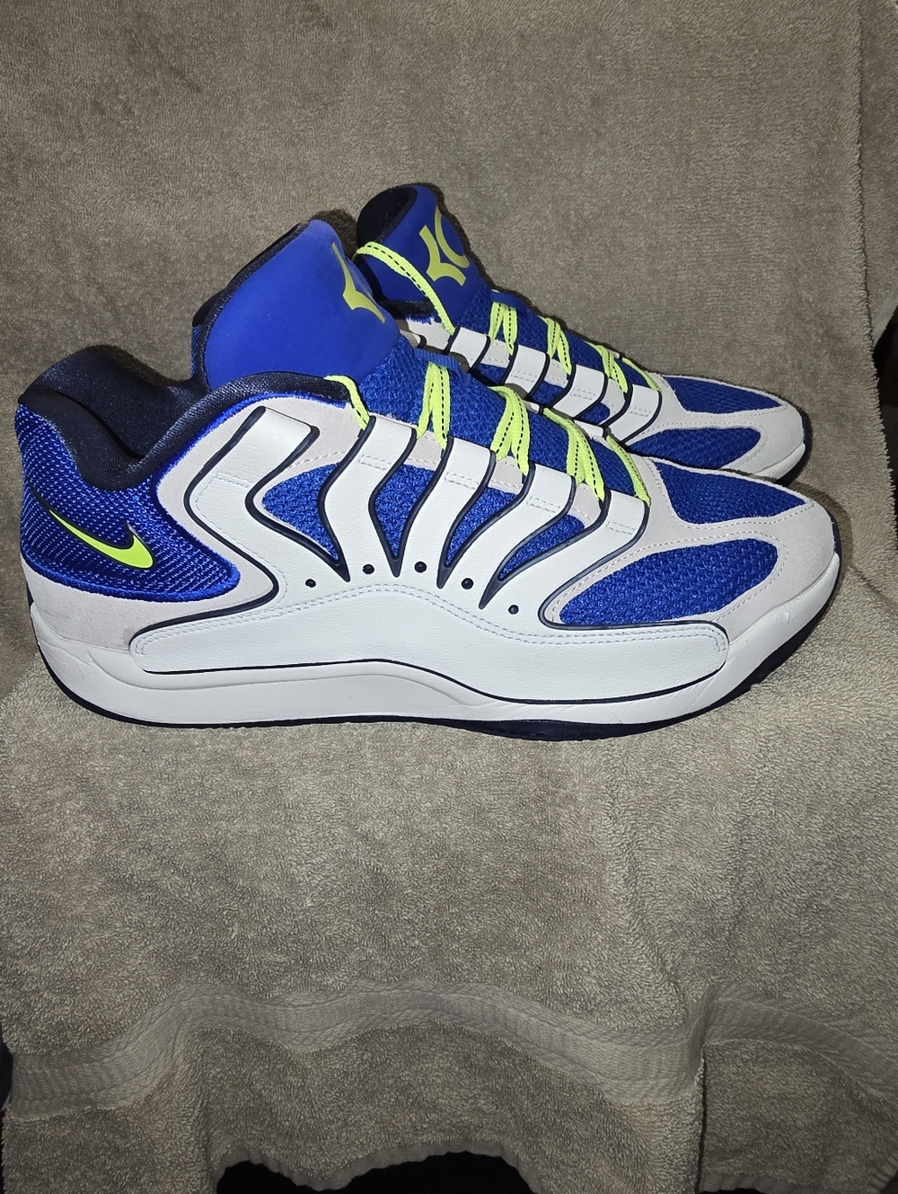 Nike KD 18 "Smart City" basketball shoes in a vibrant blue and neon yellow color
